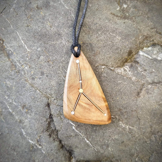 Cancer Pendant on Swamp Kauri with Metal Inlay in the shape of the constellation.