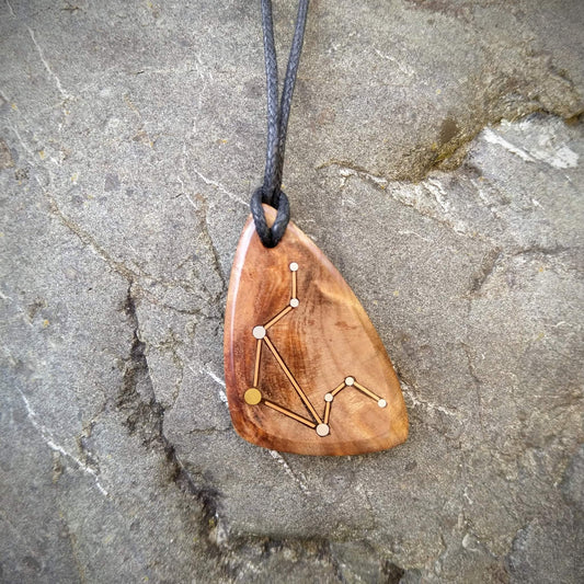 Libra Pendant on Swamp Kauri with Metal Inlay in the shape of the constellation.