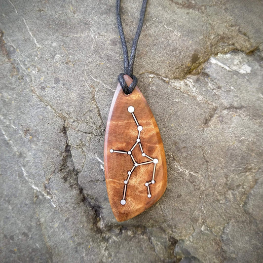 Virgo Pendant on Swamp Kauri with Metal Inlay in the shape of the constellation.